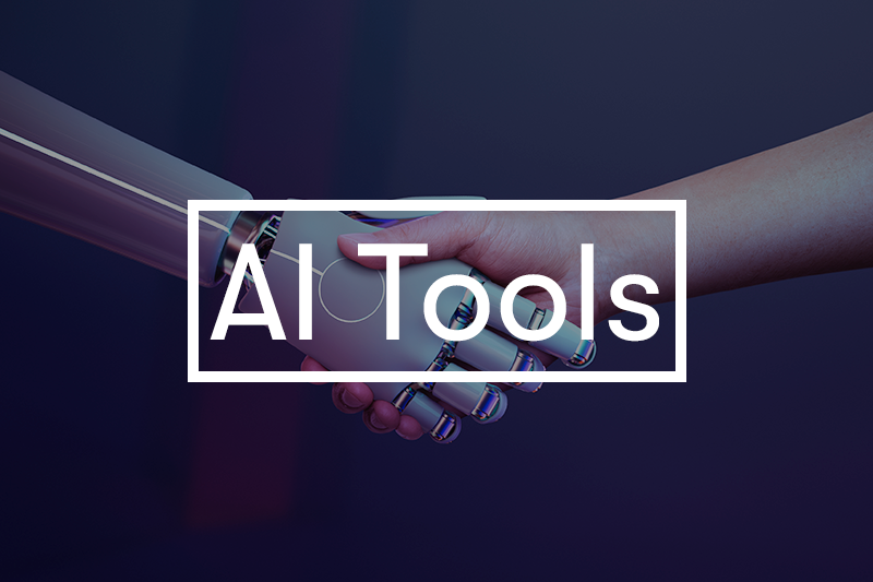 AI Tools Title in front of a robot hand shaking a human hand