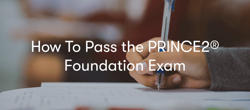 How To Pass PRINCE2 Foundation Exam text in front of someone doing an exam paper.